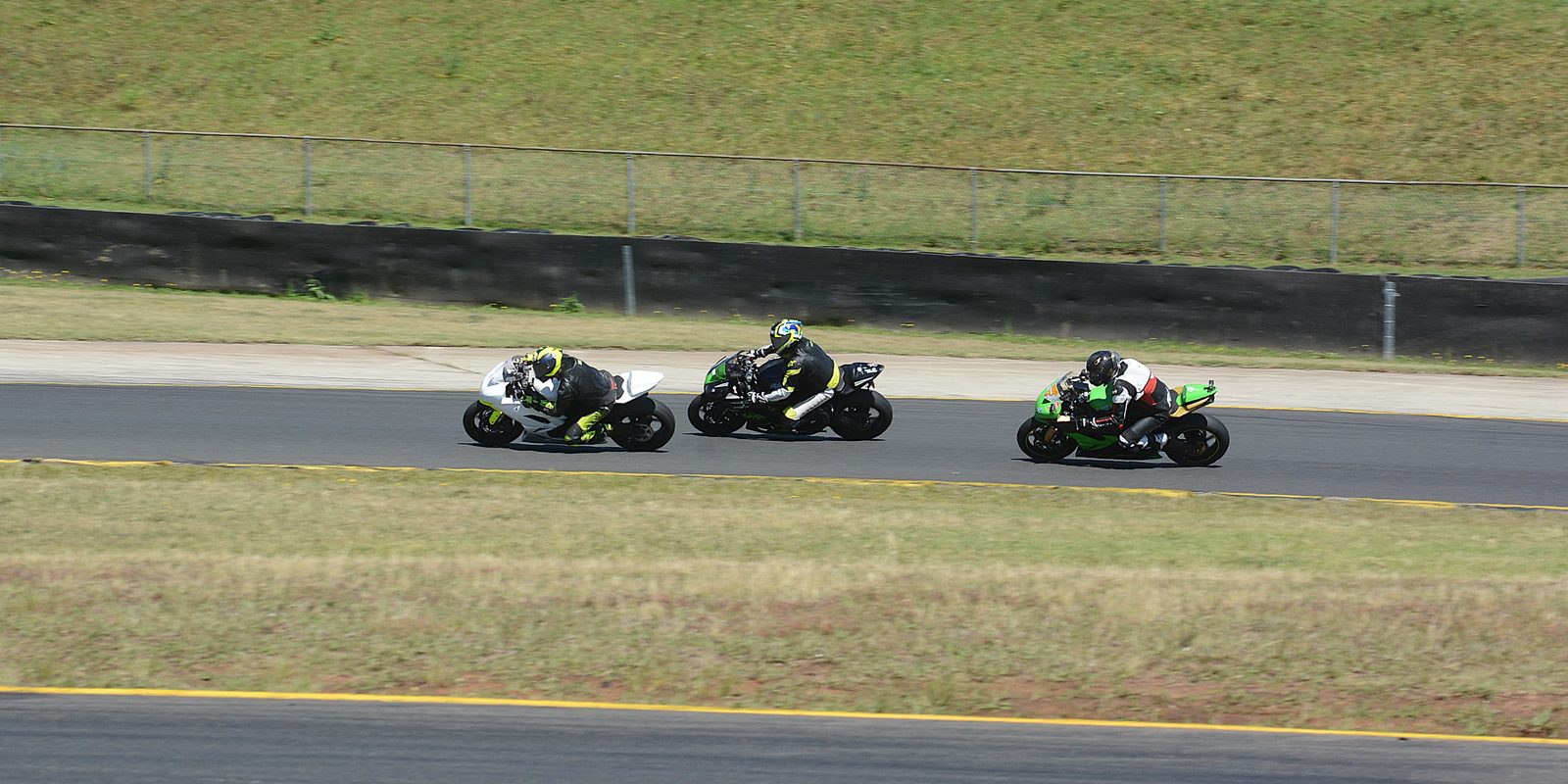 Motorcycle racers mid-corner